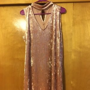 Beautiful light pink dress. Great for a night out in heels or a day to day!